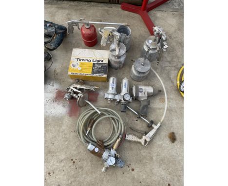 AN ASSORTMENT OF AIR COMPRESSER ATTATCHMENTS TO INCLUDE PAINT SPRAYERS AND AN IMPACT WRENCH ETC 