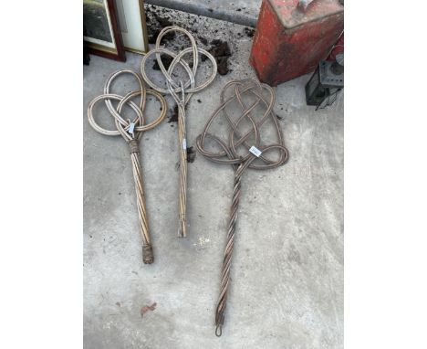 THREE VINTAGE WICKER CARPET BEATERS 