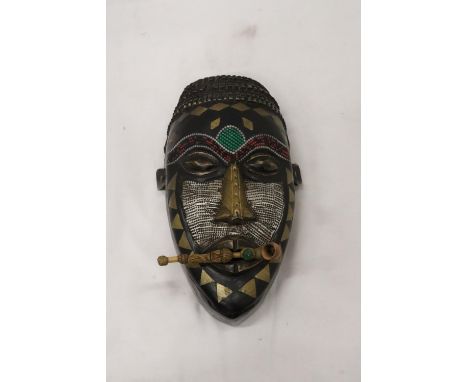 AN AFRICAN TRIBAL MASK, 29CM X 15CM PLUS A VINTAGE HANDMADE TRIBAL WOODEN PIPE 
