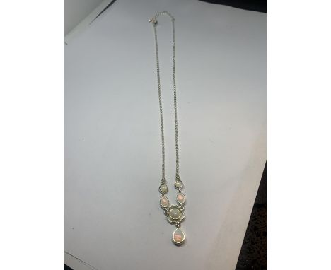 AN OPAL NV NECKLACE IN A PRESENTATION BOX 