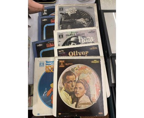 A COLLECTION OF VINTAGE VIDEO DISCS TO INCLUDE CASABLANCA, OLIVER, ROLLERBALL, MIGHTY MOUSE, ETC - 8 IN TOTAL 