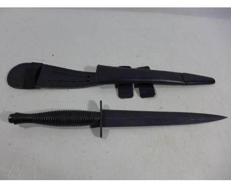 A FAIRBAIRN SYKES FIGHTING KNIFE AND SCABBARD, 18CM BLADE, CROSSGUARD MARKED WITH MILITARY BROAD ARROW, SHEFFIELD, ENGLAND, L