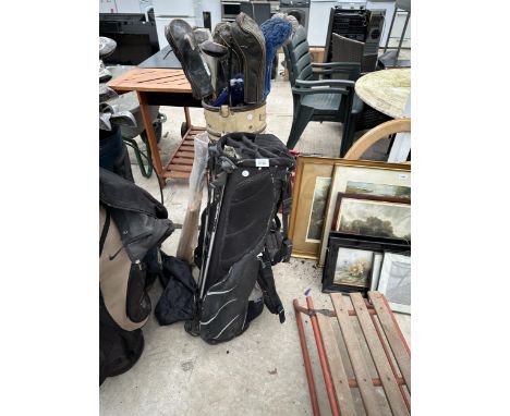 TWO GOLF BAGS AND AN ASSORTMENT OF VINTAGE GOLF CLUBS 