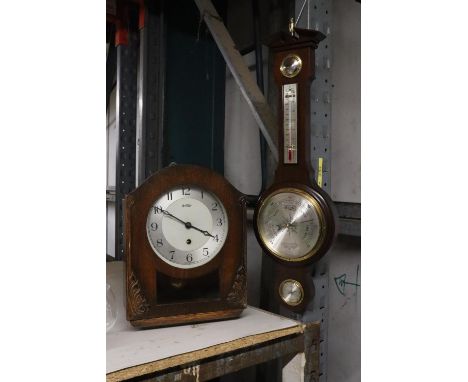 A VINTAGE MAHOGANY CASED MANTLE CLOCK AND BAROMETER 