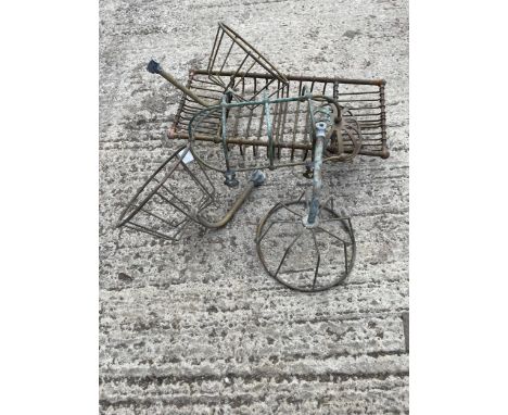 AN ASSORTMENT OF VINTAGE METAL WALL RACKS AND TRAYS ETC 