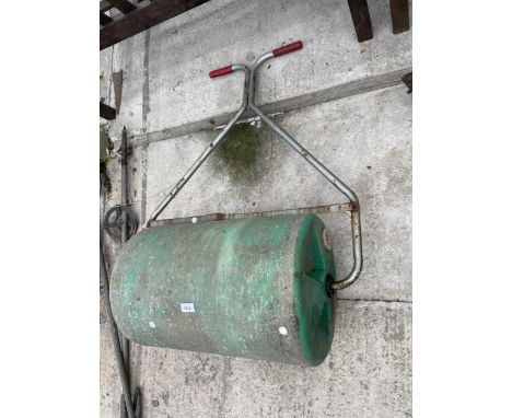 A PLASTIC BARREL GARDEN ROLLER WITH A METAL HANDLE 