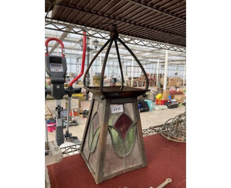 A VINTAGE METAL AND STAIN GLASS CIELING LANTERN 