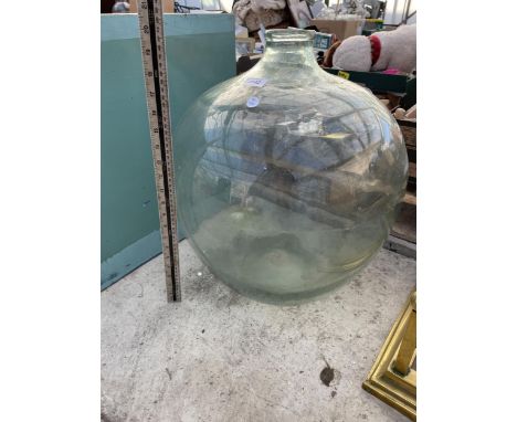 A LARGE VINTAGE GLASS CAR BOUY 