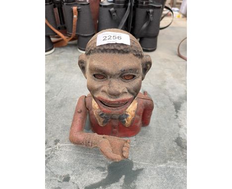 A VINTAGE NOVELTY JOLLY MAN MONEY BOX 