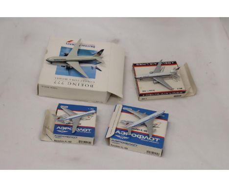 FOUR BOXED MODEL AEROPLANES 