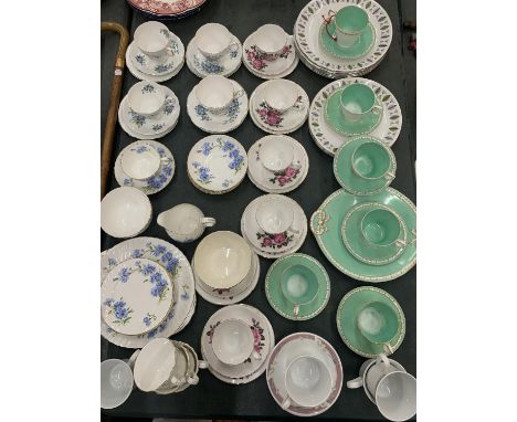 A LARGE QUANTITY OF VINTAGE TEA WARE TO INCLUDE CHINA TRIOS, ADDERLEY 'CORNFLOWER' CUP, SAUCERS, PLATES, SUGAR BOWL AND CREAM