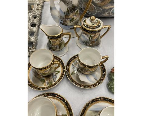 A JAPANESE COFFEE SET TO INCLUDE A COFFEE POT, A CREAM JUG, SUGAR BOWL, CUPS AND SAUCERS 