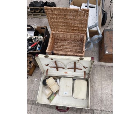 A WICKER BASKET AND A RETRO PART COMPLETE PICNIC HAMPER 