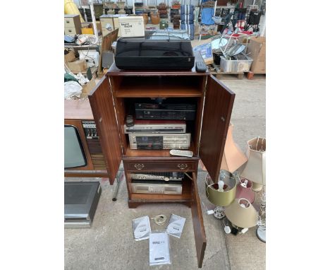 A RECORD CABINET CONTAINING A LARGE ASSORTMENT OF STEREO ITEMS TO INCLUDE AN AR RECORD DECK, SANSUI COMPACT DISC CHANGER, LUX