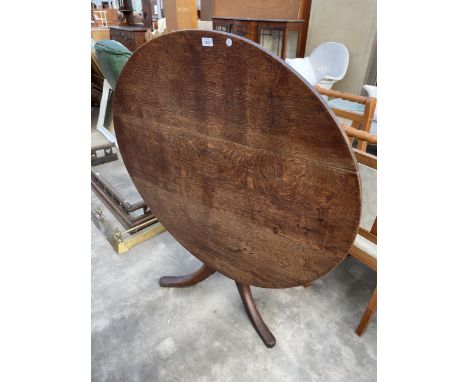 A GEORGE III OAK TILT TOP TRIPOD TABLE, 44" DIAMETER 