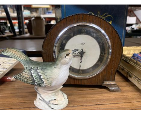 A VINTAGE SMITH'S ELECTRIC MANTLE CLOCK PLUS A CROWN STAFFORDSHIRE MODEL OF A MOCKING BIRD 