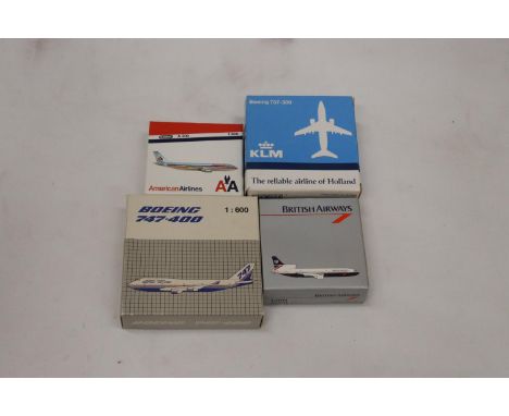 FOUR BOXED MODEL AEROPLANES 