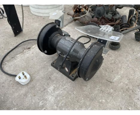 A PERFORMANCE POWER DOUBLE ENDED BENCH GRINDER 