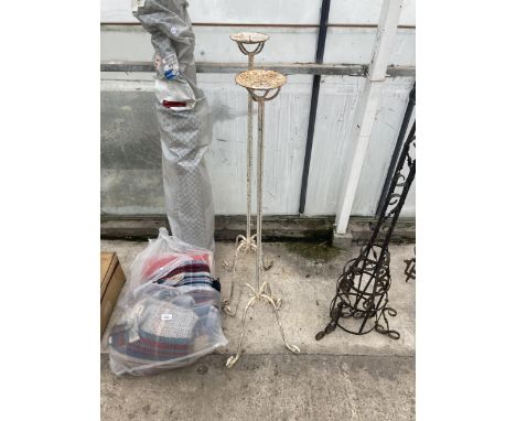 A PAIR OF VINTAGE WROUGHT IRON CANDLESTICKS 