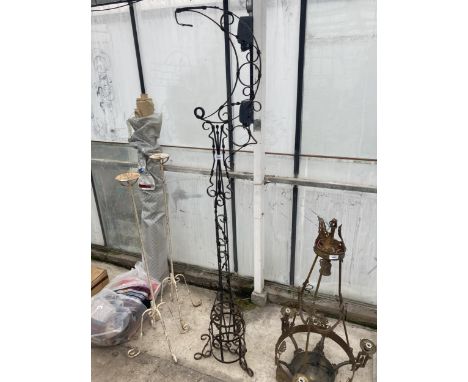 A DECORATIVE VINTAGE WROUGHT IRON HANGING STAND 