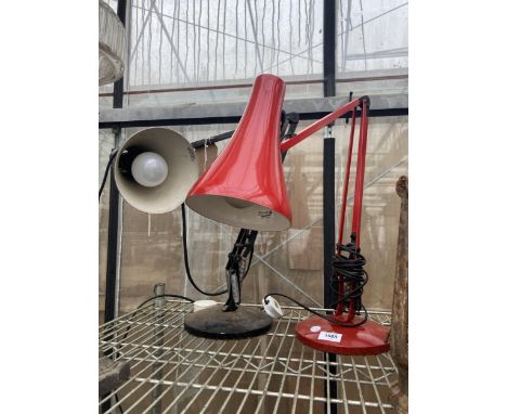 A RED ANGLE POISE LAMP AND A BLACK MODEL 90 ANGLE POISE LAMP 