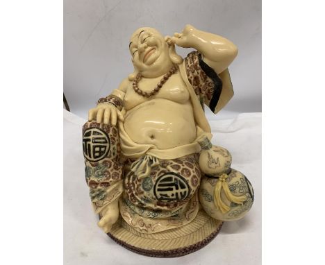 A LARGE VINTAGE BUDDAH, HEIGHT 26CM 