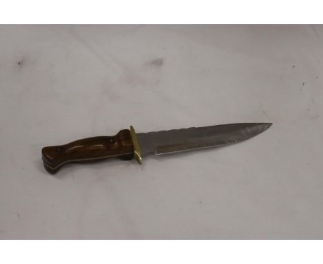 A HANDMADE DAGGER WITH WOODEN HANDLE 