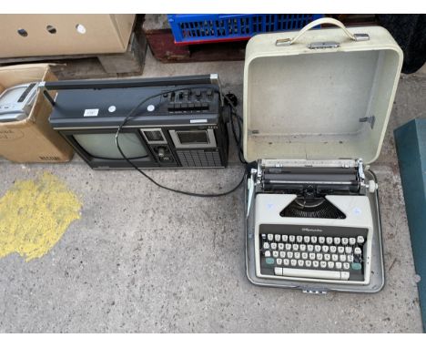 A RETRO SHARP RADIO AND A PORTABLE OLYMPIA TYPEWRITER 