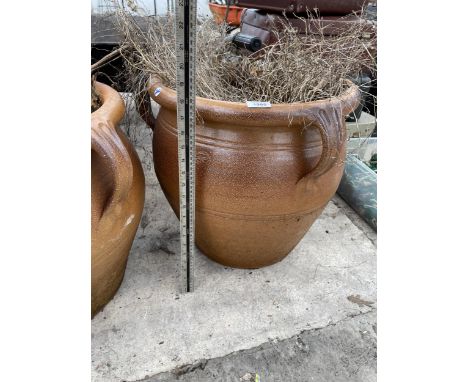 A LARGE DECORATIVE SALT GLAZED PLANTER WITH THREE HANDLES 