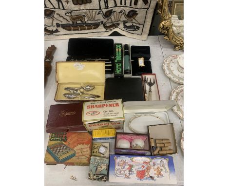 A MIXED LOT TO INCLUDE VINTAGE GAMES, BOXED FLATWARE, A HAND TELESCOPE, MINIATURE CLOCK, PAINTED EGGS IN A CASE, A PEARL STYL