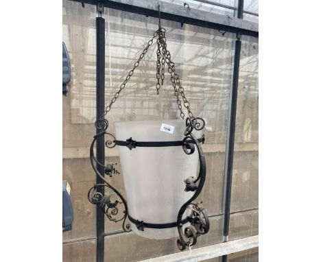 A LARGE VINTAGE FROSTED GLASS LIGHT SHADE WITH METAL DETAIL AND HANGING CHAINS 