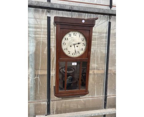 A VINTAGE MAHOGANY CASED CHIMING WALL CLOCK 