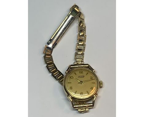 AN 18 CARAT GOLD CASED TISSOT WATCH 