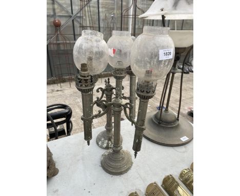 A PAIR OF VINTAGE METAL THREE BRANCH LAMPS 