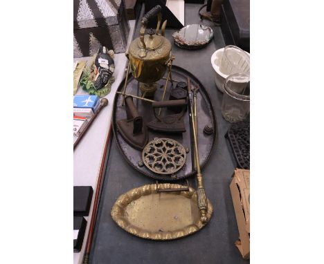 A VINTAGE LOT TO INCLUDE A LARGE METAL TRAY, A BRASS SPIRIT KETTLE AND BURNER, FLAT IRONS, WEIGHTS, A POKER AND TOASTING FORK