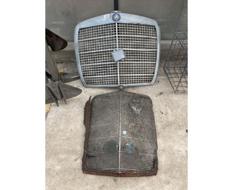 TWO VINTAGE AUTOMOBILE GRILLS TO INCLUDE A MERCEDES BENZ ETC 