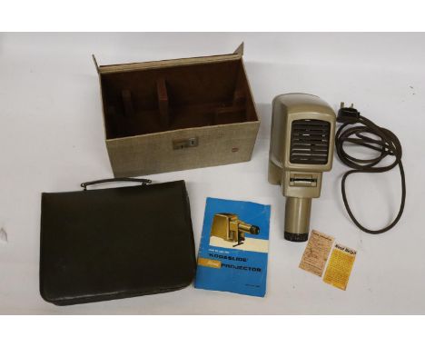 A VINTAGE KODASLIDE HOME PROJECTOR IN ORIGINAL CASE PLUS A LEATHER BRIEFCASE 