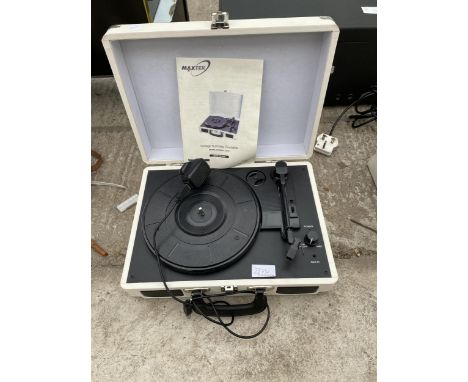 A PORTABLE MAXTEK RECORD PLAYER 