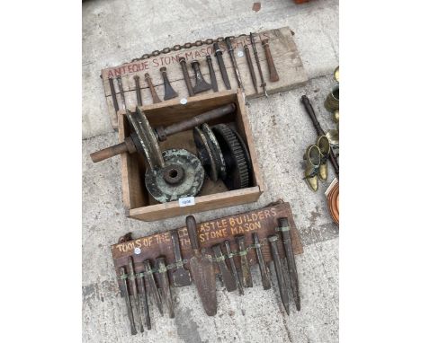 AN ASSORTMENT OF VINTAGE TOOLS TO INCLUDE PULLEY WHEELS, AND STONE MASONS CHISELS ETC 