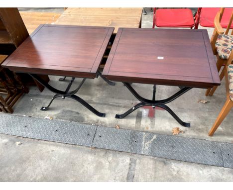 A PAIR OF MODERN HARDWOOD LAMP TABLES ON CAST IRON X-FRAME BASES, 28 X 24" EACH 