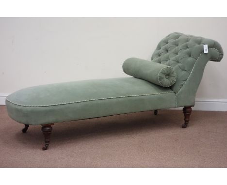 Edwardian upholstered chaise longue with boulder cushion, raised on turned walnut feet, L194cm Condition Report Click here fo