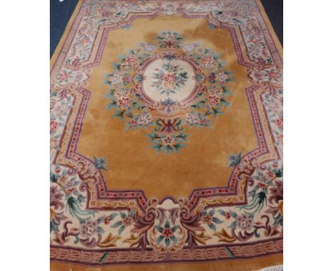 Chinese wash woollen dark mustard ground rug carpet, 340cm x 246cm Condition Report Click here for further images, condition,