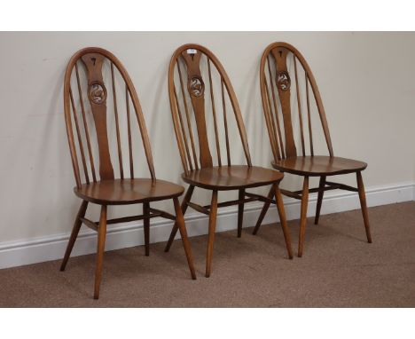 Set three Ercol elm stick and swan back dining chairs Condition Report Click here for further images, condition, auction time