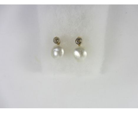 Pair of natural pearl and diamond set gold ear-rings tested to 14ct Condition Report Click here for further images, condition