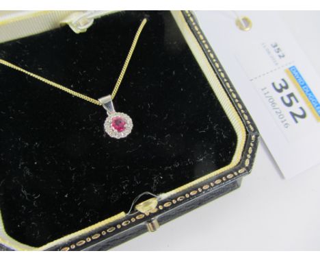 Ruby and diamond cluster pendant hallmarked 18ct on 40cm chain stamped 375 Condition Report Click here for further images, co