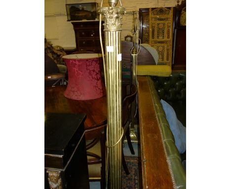 Edwardian brass lamp standard with a fluted column and square stepped base with paw feet