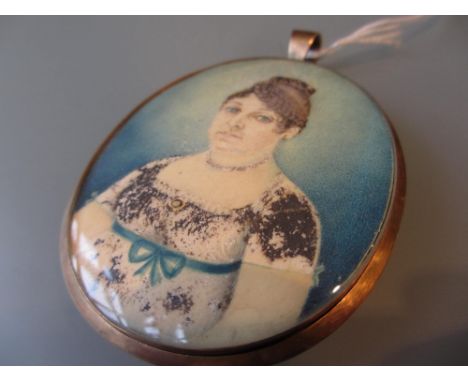 19th Century yellow metal pendant inset with a painted portrait of a lady
