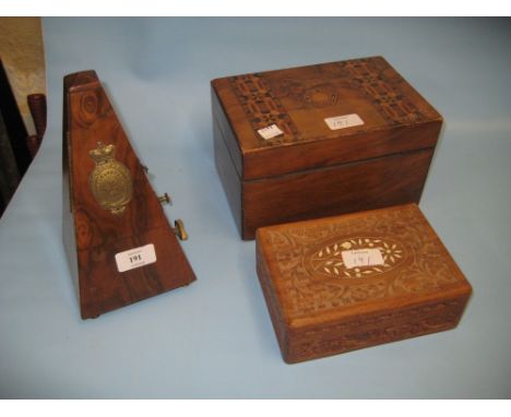 Walnut cased metronome, parquetry inlaid work box and a carved work box