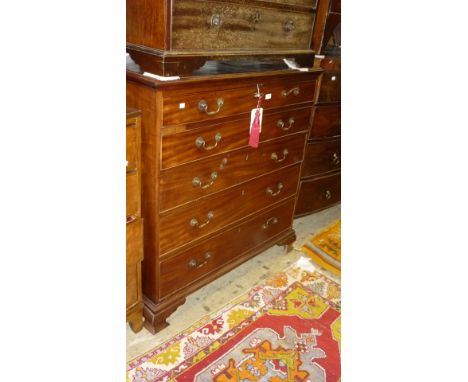 George III mahogany secretaire chest having moulded top over two dummy drawer fall front enclosing fitted interior and a furt