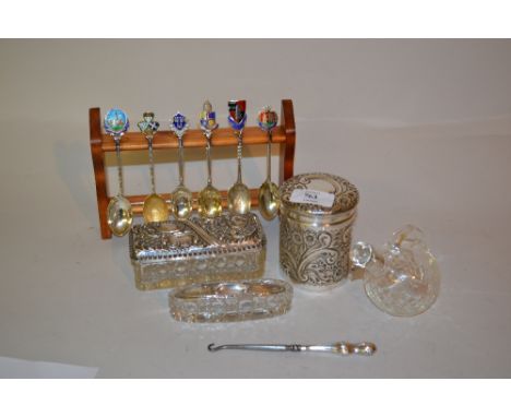 Birmingham silver circular floral embossed pot and cover, two silver and cut glass dressing table items and a silver collared